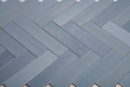 Wandtegel Tempo Aqua 6,5x25 in visgraatverband | Sanimaster