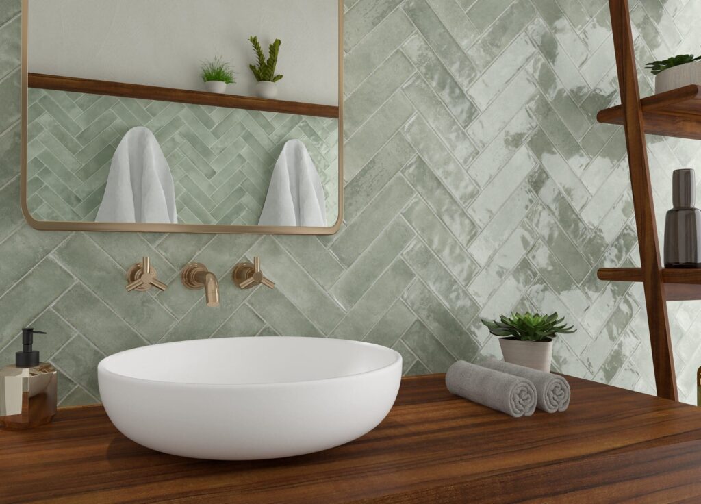 Sfeerfoto in een badkamer van Brunei Sage tegels in visgraatverband van Sanimaster