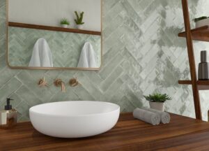 Sfeerfoto in een badkamer van Brunei Sage tegels in visgraatverband van Sanimaster