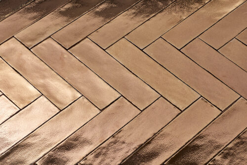 Wandtegel Handvorm goud 7,5x30