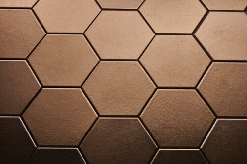 Hexagon tegels in de kleur brons.