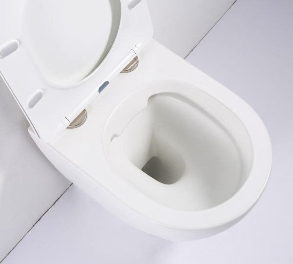 Een open wit toilet.